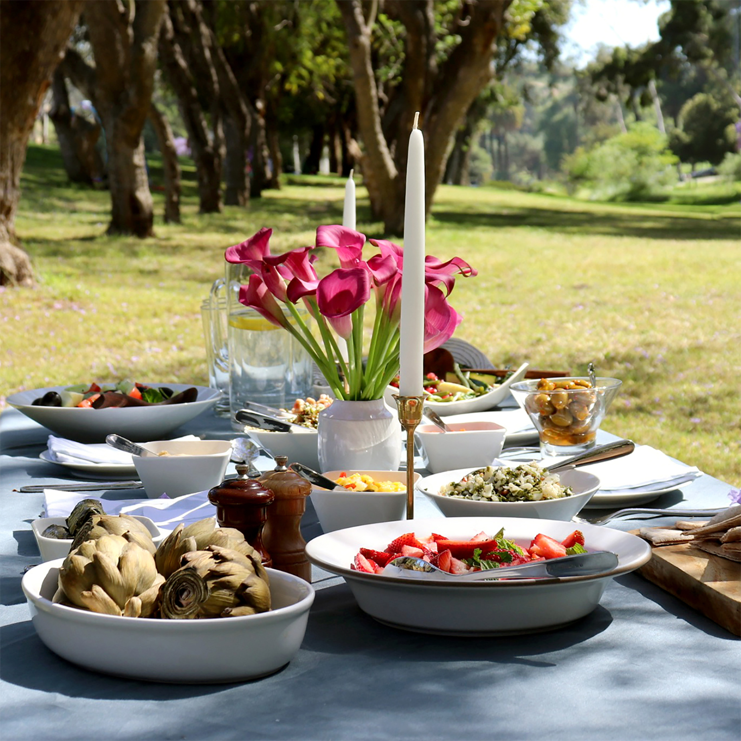 Luxury outdoor dining - green table linens and immunity-boosting food